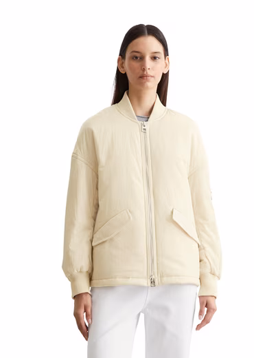 Blouson patch arm pocket with zipper